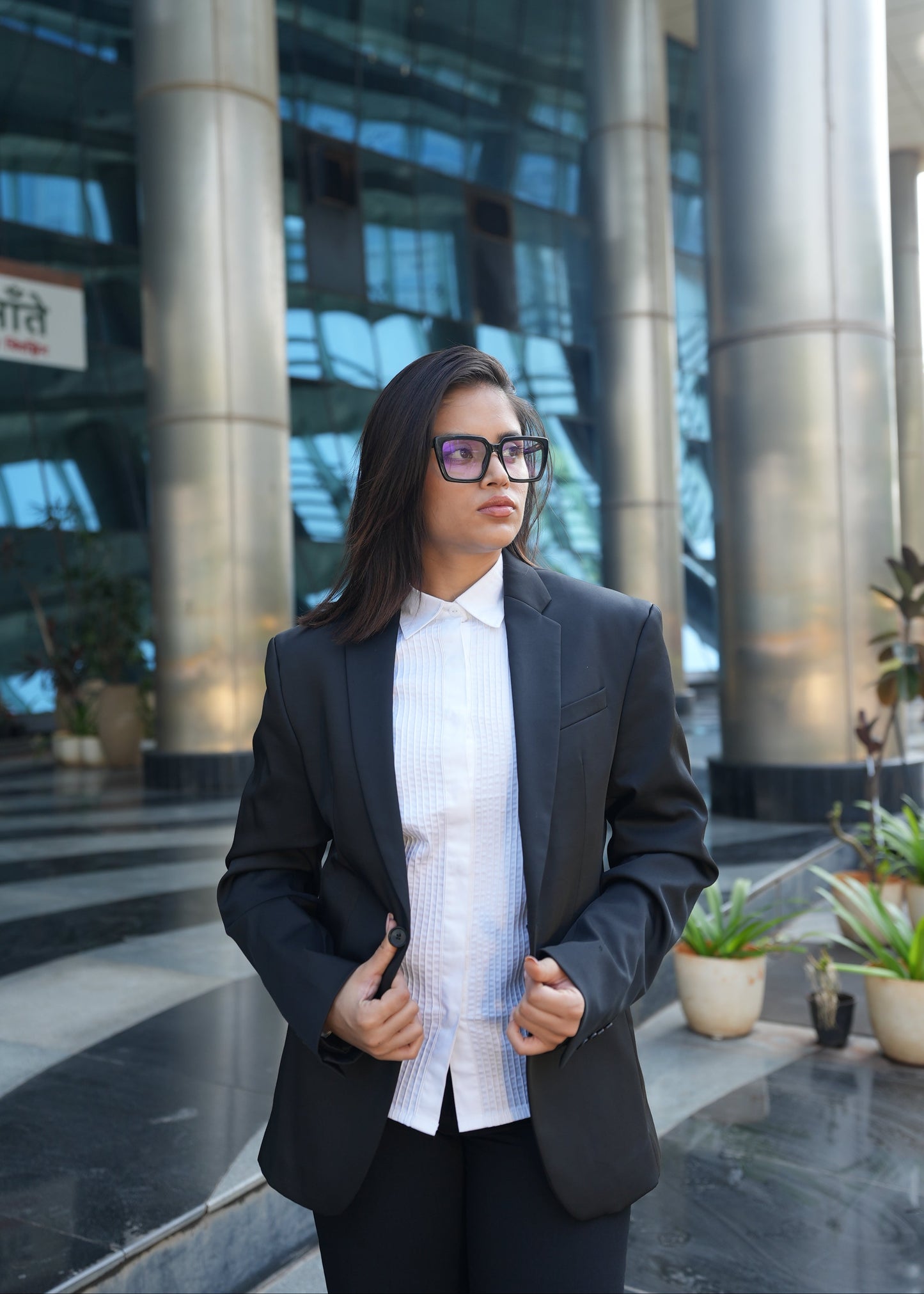 White pintuck shirt styled with blazer — women's elevated formalwear — Twelve
